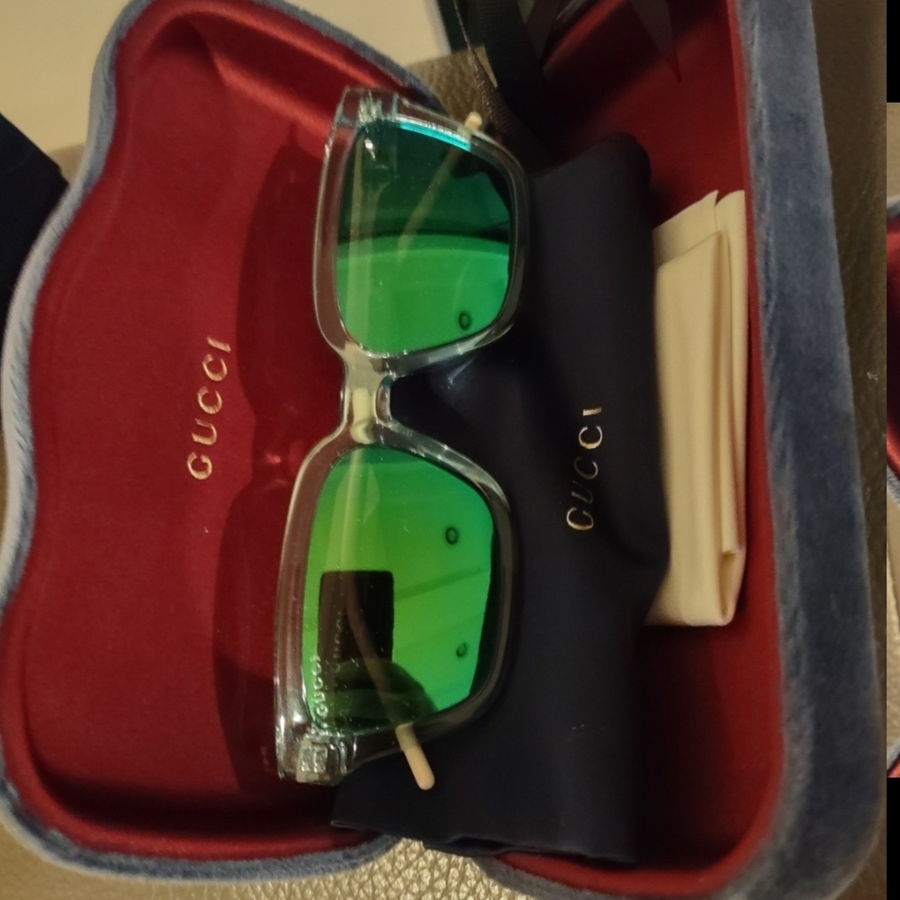Gucci Transparent Frame Sunglasses with Green Lenses